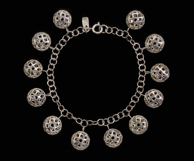 Silver lattice bead charm bracelet.
