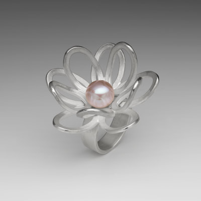 Silver lotus flower ring with pink pearl.